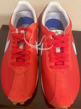 Nike Women’s Red and White Low-Top Sneakers